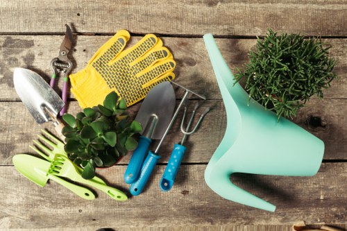 Gardener with tools preparing a garden site